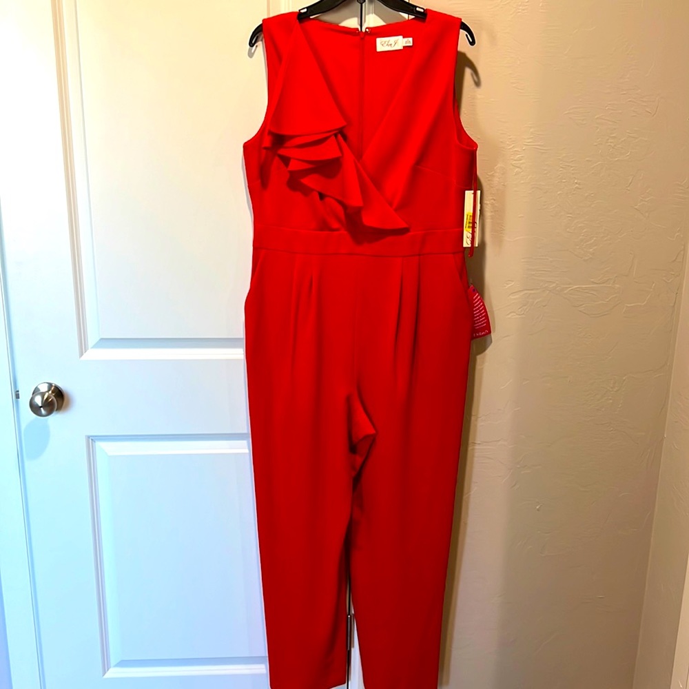 Red pant suit with tags